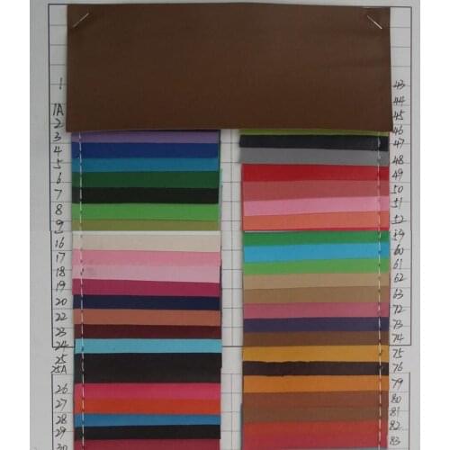 Thin 0.5mm PVC leather fabric Spunlace bottom artificial leather material wholesale factory cheap price