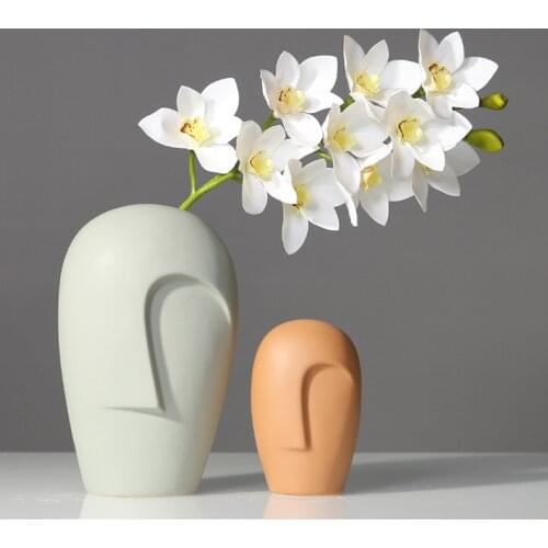 New creative Nordic modern minimalist style ceramic vase with human face, personalized decoration in the club hall