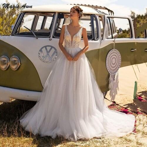 Magic Awn Princess Lace Tulle Wedding Dresses Boho V-Neck Appliques Sequins Beach A-Line Bridal Gowns Illusion Robe Mariage