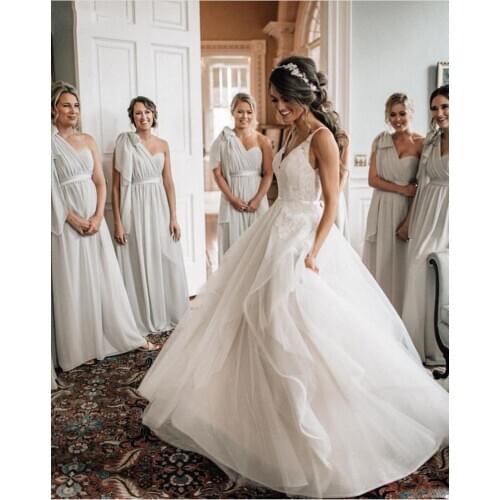 Romantic Spaghetti Strips Ball Gown Wedding Dresses 2020 Sexy Backless Ruffles Bridal Gowns Lace Top Plus Size Wedding Dressr