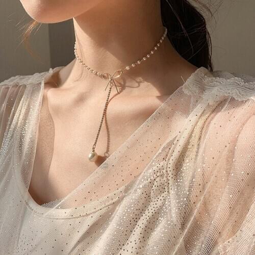 Rise And Dance In A Happy Mood Exceed Immortal Pearl Bow Long Necklace Woman East Gate Temperament Internal Structure