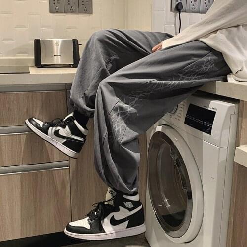 Spring print striped pants mens Korean version of the trend of the new loose sports and leisure students nine-point beam pants