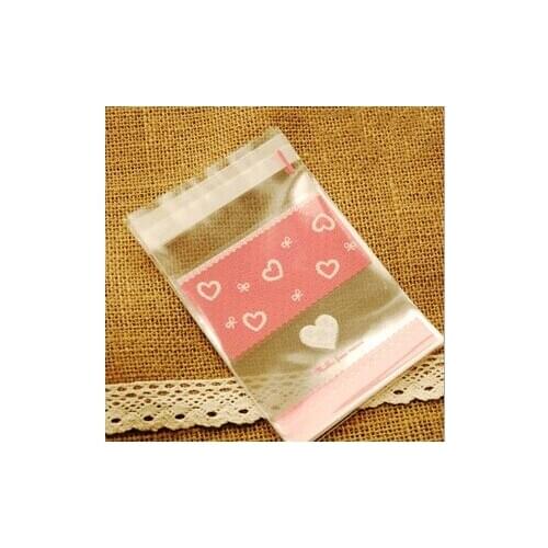 E1 Attractive 10*14cm Cookie packaging Pink heart lace clear self-adhesive plastic bags for biscuits snack baking package