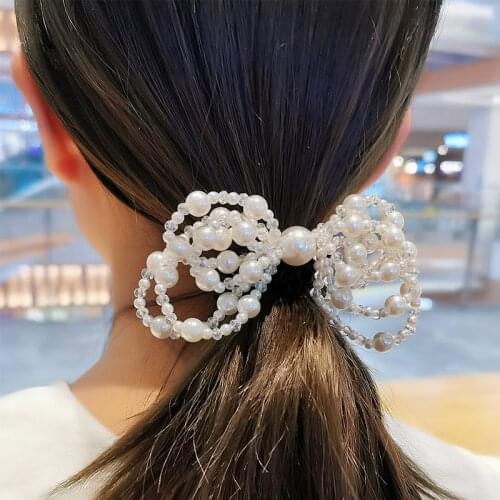 The New Super fairy Bow Pearl Hairpin Hair Ring Sweet Lady Celebrity Net Red Hair Rope Hair Accessories Trendy