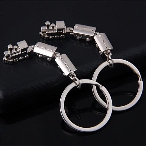 FREE SHIPPING BY DHL 100pcs/lot Novelty Mini Train Shaped Keychains Zinc Alloy Vintage Train Keyrings for Tourist Gifts