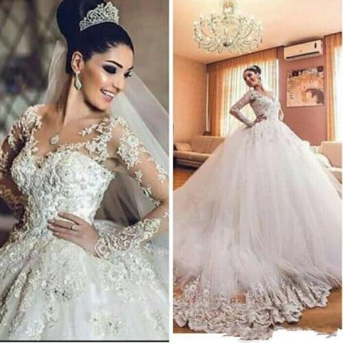 African Arabic Vintage Wedding Dresses 2021 Sheer Neck 3D Floral Appliques Long Sleeves Wedding Dress Luxury Tulle Saudi Arabia