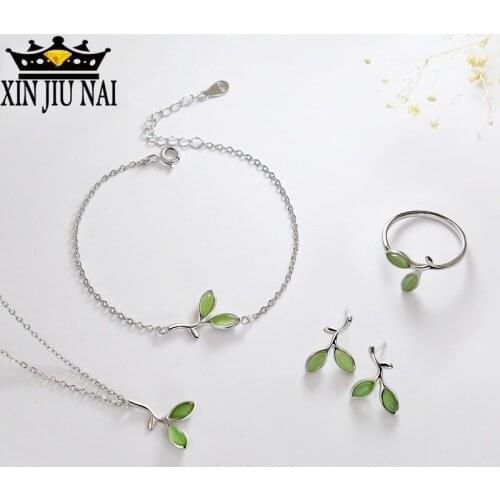 Small fresh cute delicate bud female simple creative Green cats eye gem Flower bud jewelry four-piece jade set emerald jewelry