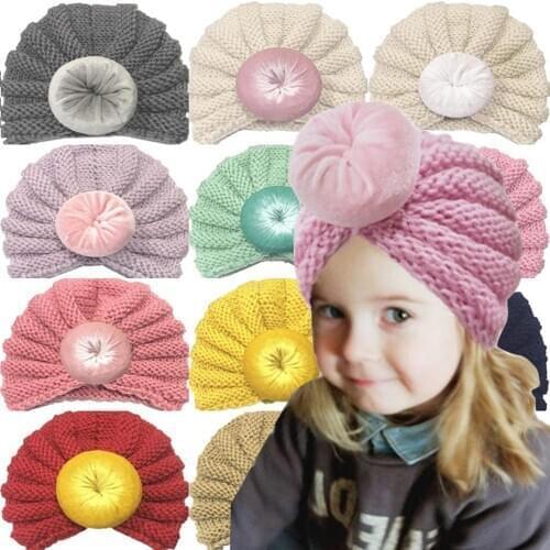 Childrens cute hat baby solid color donut woolen hat European and American boys and girls pullover elastic hat