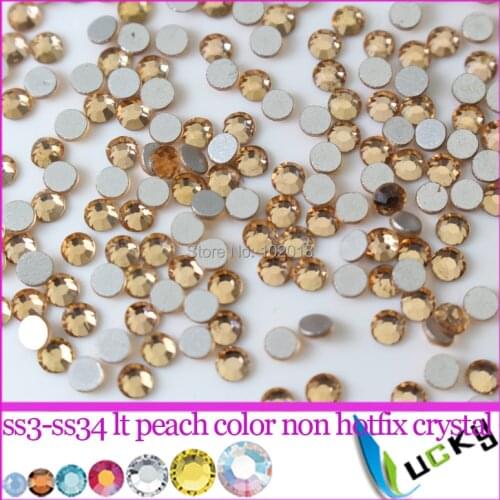 Top quality Lt peach color Flat back non hotfix rhinestones All sizes available Super shiny crystal Machine cut nail strass