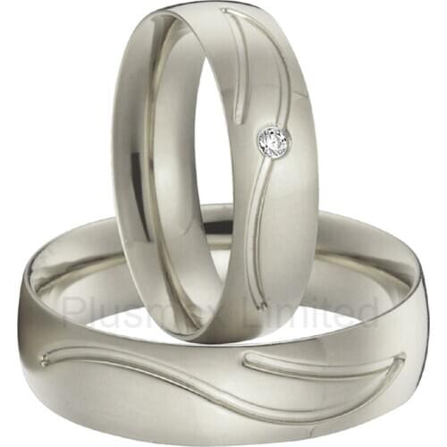 China Manufacturer arc shaped inside silver color CNC engrave pattern titanium steel wedding rings for men and women