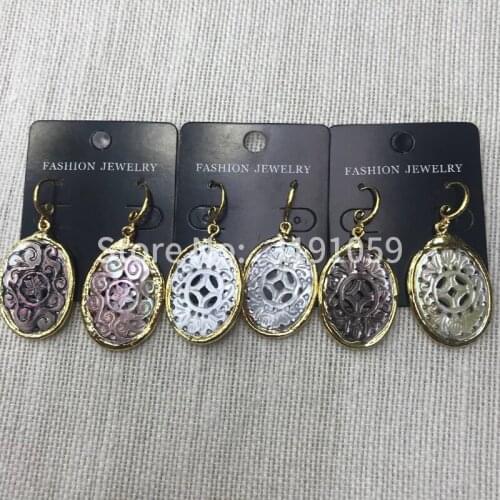 Exquisite hand-carved earrings with stylish and versatile texture, shell pendant