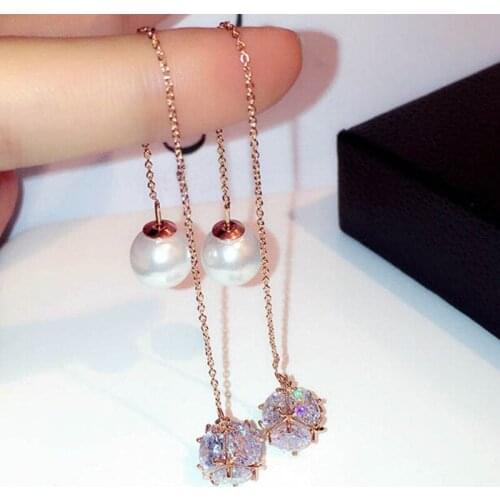 Charmwin New Fashion Classic Long Dangle Earrings Korean Zircon Super Flash Simulated Pearl Ear Wire Earrings For Women PE1280