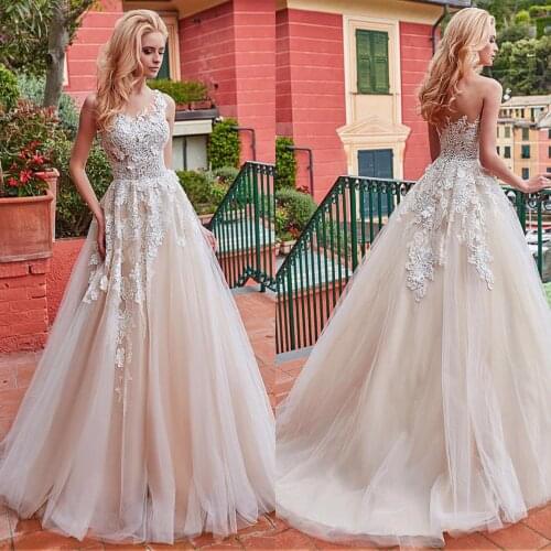 Marvelous Tulle Jewel Neckline A-line Wedding Dress With Lace Appliques Bridal Dress Court Train Champagne Marvelous Tulle Jewe