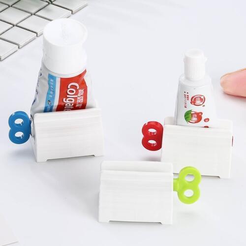 Convenient Toothpaste Rolling Tube Toothpaste Squeezer Stand Holder Bathroom Accessories Manually Facial Cleanser Extruder