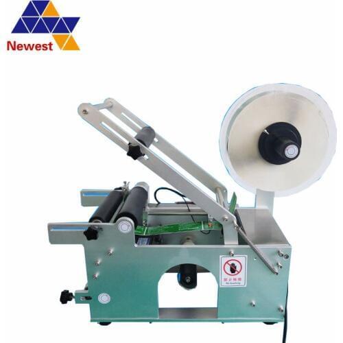 Essential oil bottle labeling machine/manual bottle labeling machine/pet bottle labeling machine