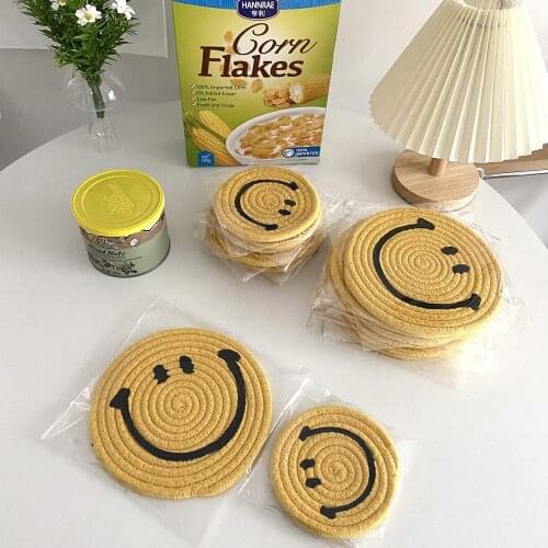 Hand-woven yellow smiley coaster cute home anti-scalding insulation pad placemat desktop decoration photo props
