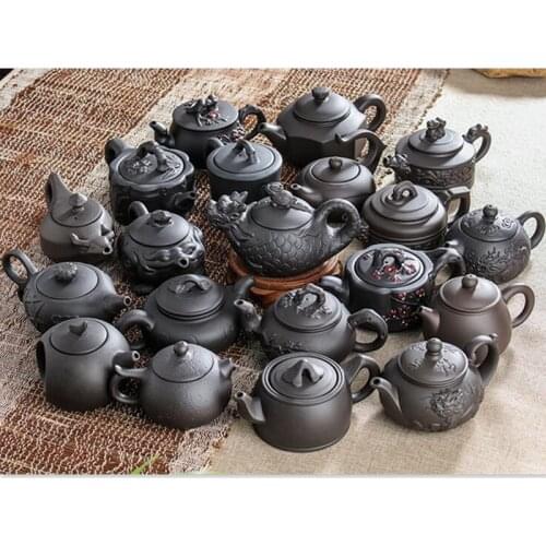 Yixing Purple Clay Teapot Small Capacity Plum blossom Teapot Small Ball Hole Filter Teapot Ceramic Household Kungfu Tea Set