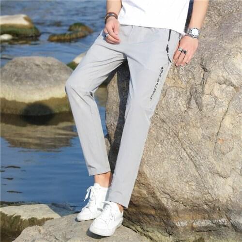MenS Casual Pants Slim Fit Small Feet Korean Fashion Ice Silk Thin Summer Solid Color Printing Simple Nine Point Trousers Boy