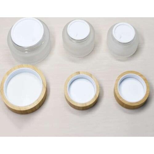 Wholesale Customized Eye Shadow Lip Gloss Panckaging Jar With Bamboo Lid For Cosmetic Face Cream CBD Herb Cream Glass Containers