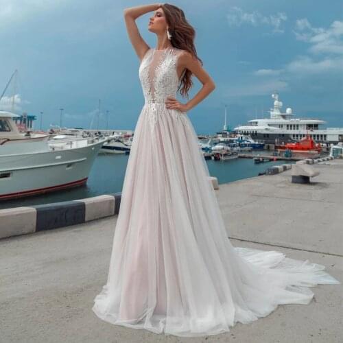 Sheer O-Neck Beach Wedding Dresses 2021 A-Line Sleeveless Lace Appliques Boho Tulle Bridal Gown With Button Back Sweep Train