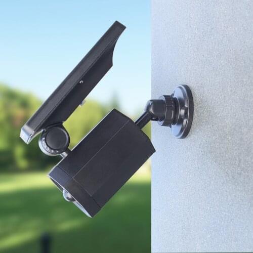 The new solar wall lamp simulation monitoring fake camera human body infrared sensor garden lamp garden lamp spotlight