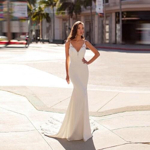 Modern Slim Mermaid Lace Back Out Bridal Wedding Gowns Sleeveless Plunge V Neckline Wedding Dresses for Bride Court Train 2021