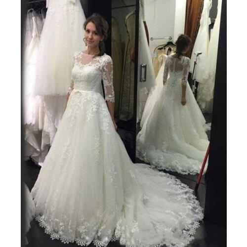 Robe de mariee wedding dress Lace Appliques Half Sleeve See Though Buttons Back Whit Tulle A Line Bridal Dress For Women