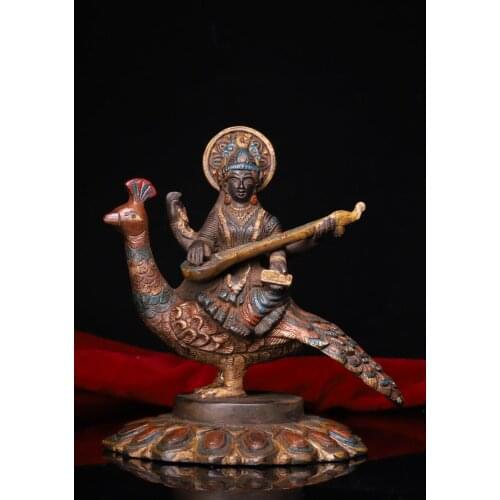 Tibetan Monastery Collection Copper tires are beaten by hand, chiseled, and painted with beautiful sounds statue