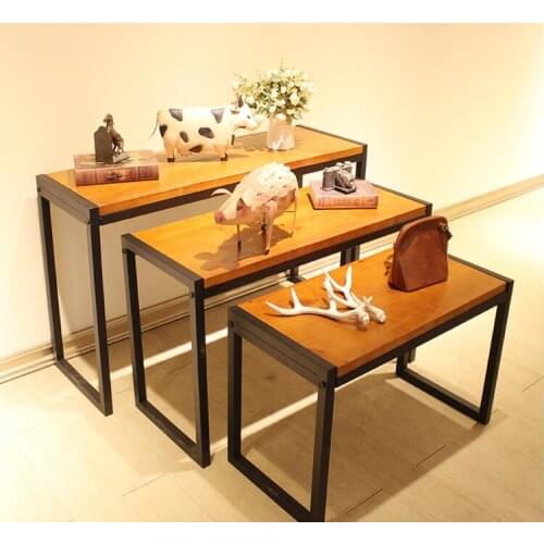 The high and low stage of the clothing store. The vintage real wood display table shoe rack 1112