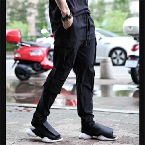 Korean fashion brand 2021 mens new solid color multi pocket closed foot fashion overalls loose leisure sports pants