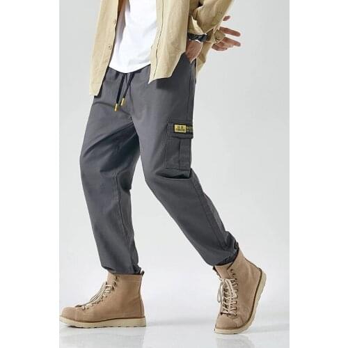 Summer Men cargo pockets pants korea style elasticity pencil pants large size 6XL 7XL casual skateboard pants elasticity