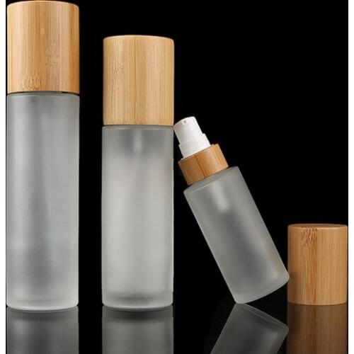 Bamboo cosmetic perfume bottle 30ml 50ml 100ml 120ml 150ml frosted glass cream spray lotion bottle with bamboo spray pump caps