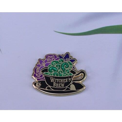 If you love all things witchy and are partial to a bit of glitter then this Witches Brew Enamel Pin is for you