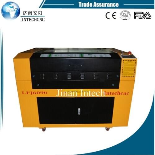 China 60w 80w 100w 6090 laser paper cutter/4x8 veneer plywood laser cutting machine