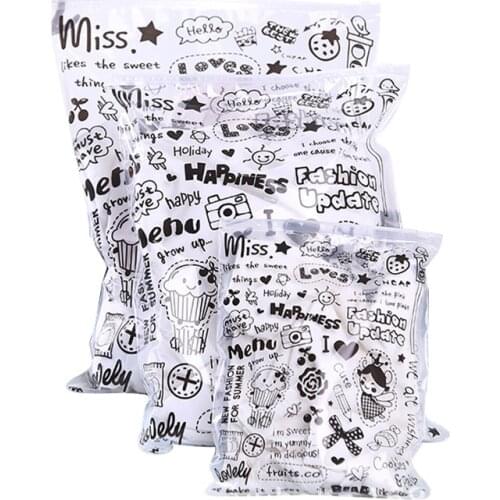500pcs/lot Cartoon clothing storage bag plastic bags Waterproof garment shoe luggage bag Clothing retail bag