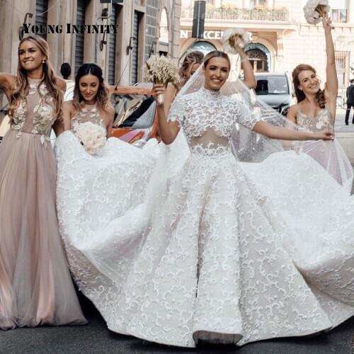 Romantic Ball Gown Wedding Dress 2020 High Neck Short Sleeves Lace Bridal Gown Illusion Design Royal Train Duabi CUstom made