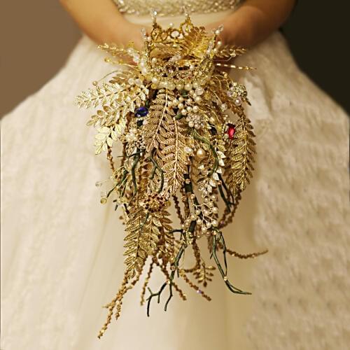 Iffo bride hand holding flower bouquet wedding Gothic style gold leaf red & blue gemstone pearl crown simulation tree DIY decor