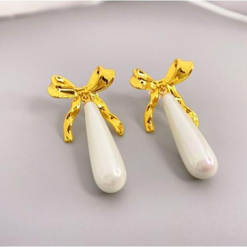 New European and American personalized bow tie with long pearl earrings womens fashion design fashion earrings