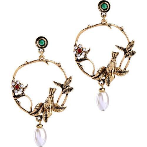 In 2019, the new brand design flower three-dimensional bird earrings for women