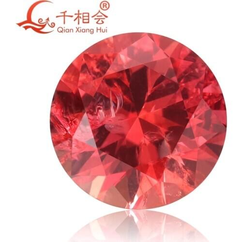 Artificial sapphire padparadscha color round shape natural cut including minor cracks and inclusions corundum loose gem stone