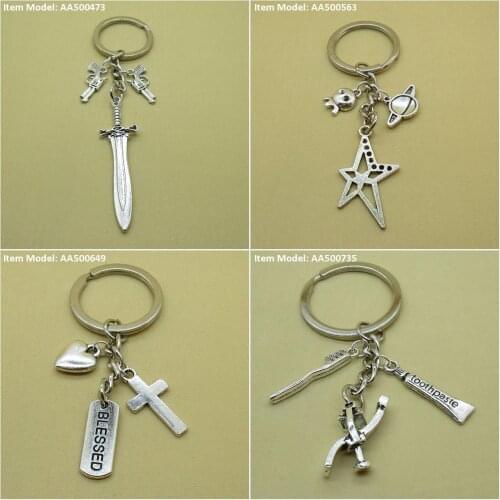 Keychain Keyring Sword Gun Revolver Star Pentagram Saturn ET UFO Alien Sign Tag Blessed Cross Latin Heart Love Bed Dental
