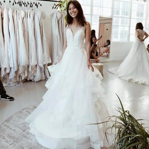 Charming A Line Tiered Tulle Wedding Dresses V-Neck Lace Appliques Sweep Train Gorgeous Bridal Gowns With Low Back Custom Made