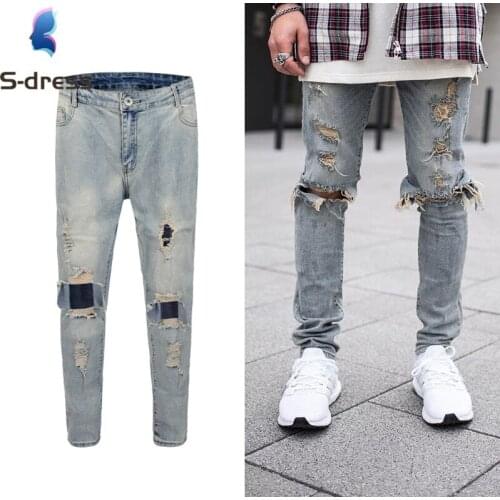 New mens wear European and American high street knee damage hole blue washed distressed mens jeans trend
