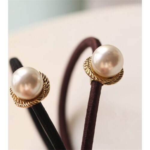 Hot New Simple small fragrant imitation pearl metal rotating wind the rubber band Tousheng Jewelry crystal jewelry