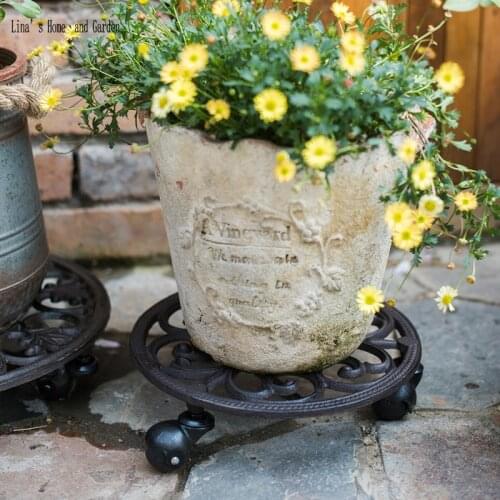 Cast iron antique flower pot tray with wheels