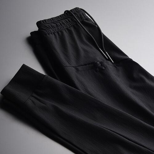 Man Luxury Spring New Drawstring Waist Fashionable Skinny Pants Men Plus Size 4xl Draping Cutting Mens Trousers