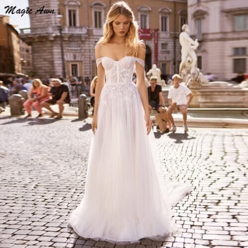 Magic Awn Off The Shoulder Boho Wedding Dresses Lace Appliques Spot Tulle Illusion Beach A-Line Birde Dress Sweep Train Boda