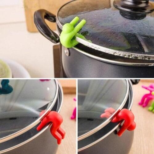 1pc Creative Small Man Anti-overflow Pot Rack Silicone Multi-functional Phone Bracket Universial Home Kit Kitchen Cooking Tool