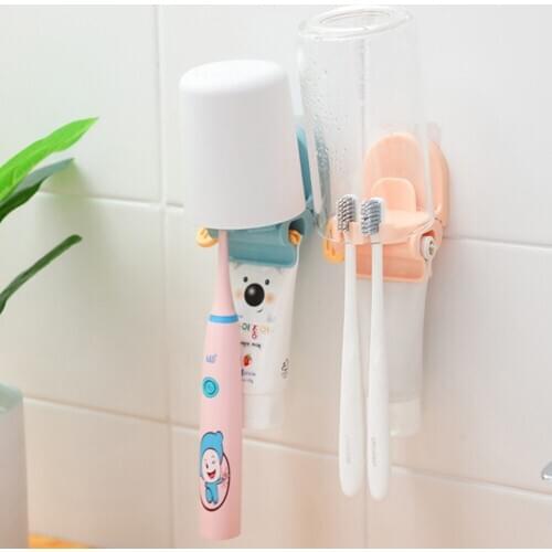 Household bathroom toilet cup organizer multifunctional toothpaste squeezing wall-mounted free punch bathroom storage rack