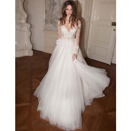 2018 Sexy illusion Fall Backless bridal gown Long Sleeve Appliques Floor Length Sheer Neck Vestidos de Noiva bridesmaid dresses